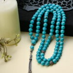 A 99-bead rosary made of distinctive natural Hawlalite stone.