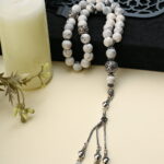 A distinctive 33-bead Hawlalite rosary.