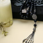 A 33-bead rosary made of natural Star Agate.