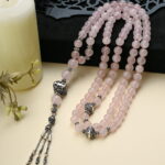 A distinctive rosary with 99 beads made of natural Rose Quartz.
