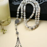 A 99-bead rosary made of natural Moonstone.