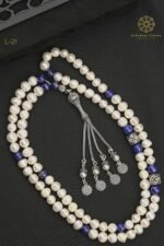 Rosary made of natural farmed pearls inlaid with beads of blue lapis lazuli and Turkish silver