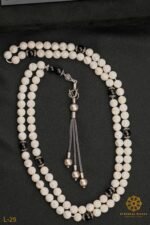 Rosary , natural mother -of-pearl beads, inlaid with beads from Al-Yusr Al Baladi ( Red Sea ) , size 8 mm, inlaid with Turkish silver caliber . 925.