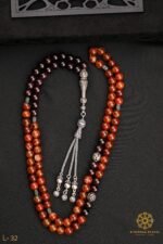 Rosary made of agate intertwined with garnet stone.