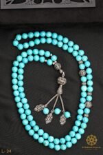 Rosary made of distinctive natural howlite stone.