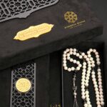 Rosary , natural mother -of-pearl beads, inlaid with beads from Al-Yusr Al Baladi ( Red Sea ) , size 8 mm, inlaid with Turkish silver caliber . 925.