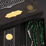 An Ottoman rosary with an Islamic heritage character. A rosary made of Tiger Eye stone and a pure green color charm ... 8 mm , 99 beads, inlaid with distinctive Turkish silver, 925 caliber.