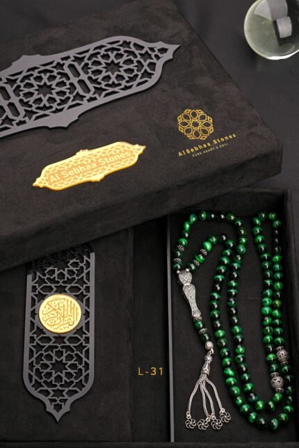 An Ottoman rosary with an Islamic heritage character. A rosary made of Tiger Eye stone and a pure green color charm ... 8 mm , 99 beads, inlaid with distinctive Turkish silver, 925 caliber.