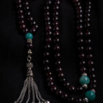 Rosary made of garnet stone inlaid with amazonite stone.