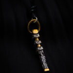 A pendant of the Kaaba key.