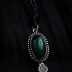 A pendant made of malachite stone.