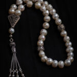 Rosary made of bearish from Pearls Farmer Natural.